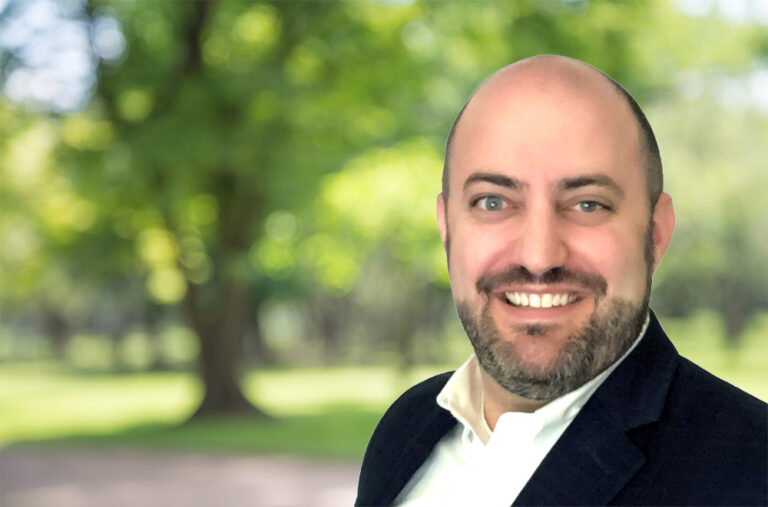 David Bernstein, an expert from Weston Solutions, smiling in a professional headshot against a blurred outdoor park background.